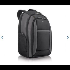 NWOT SOLO black Backpack. 3 compartments / laptop